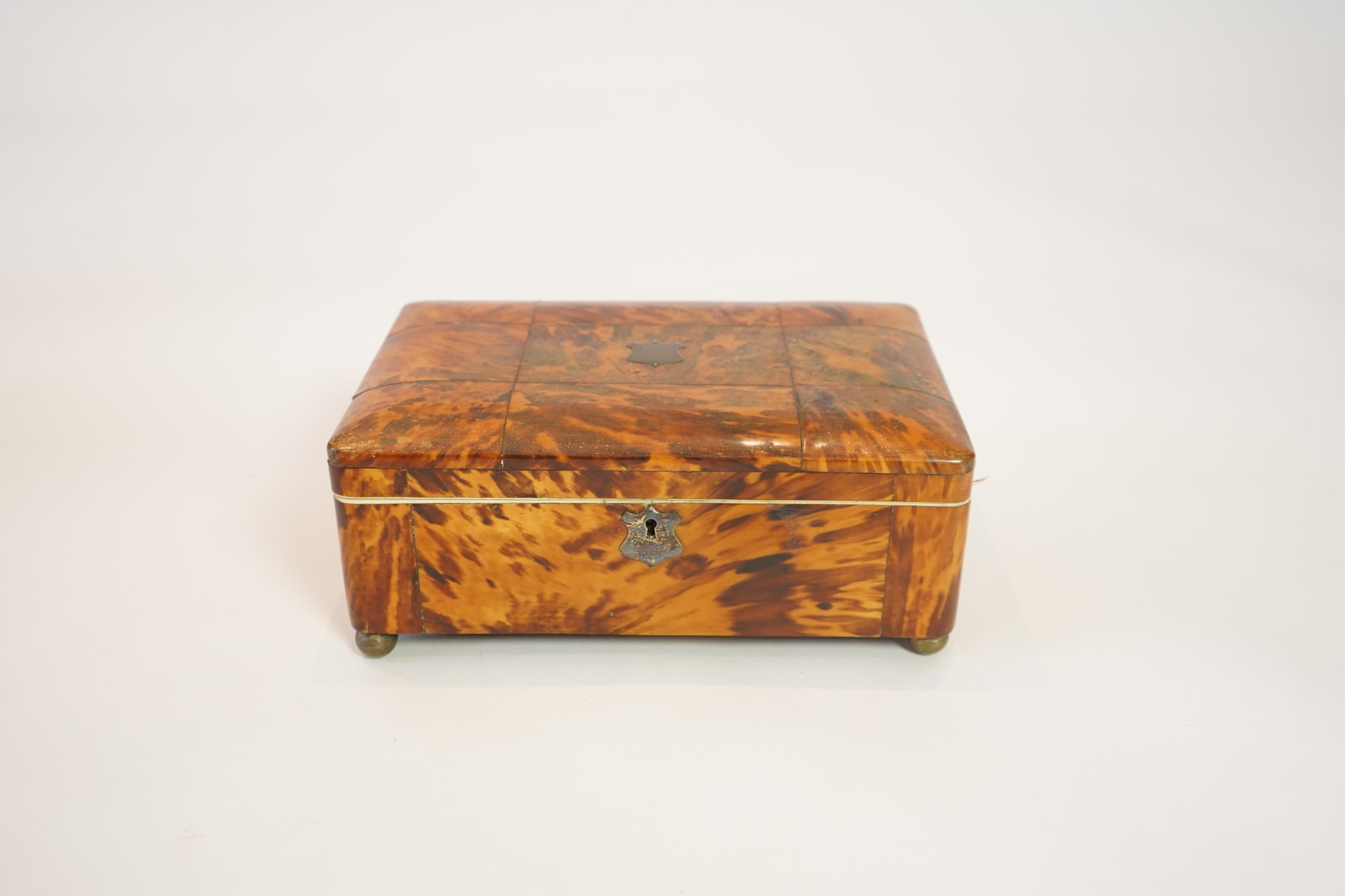 An early 19th century blonde tortoiseshell work box